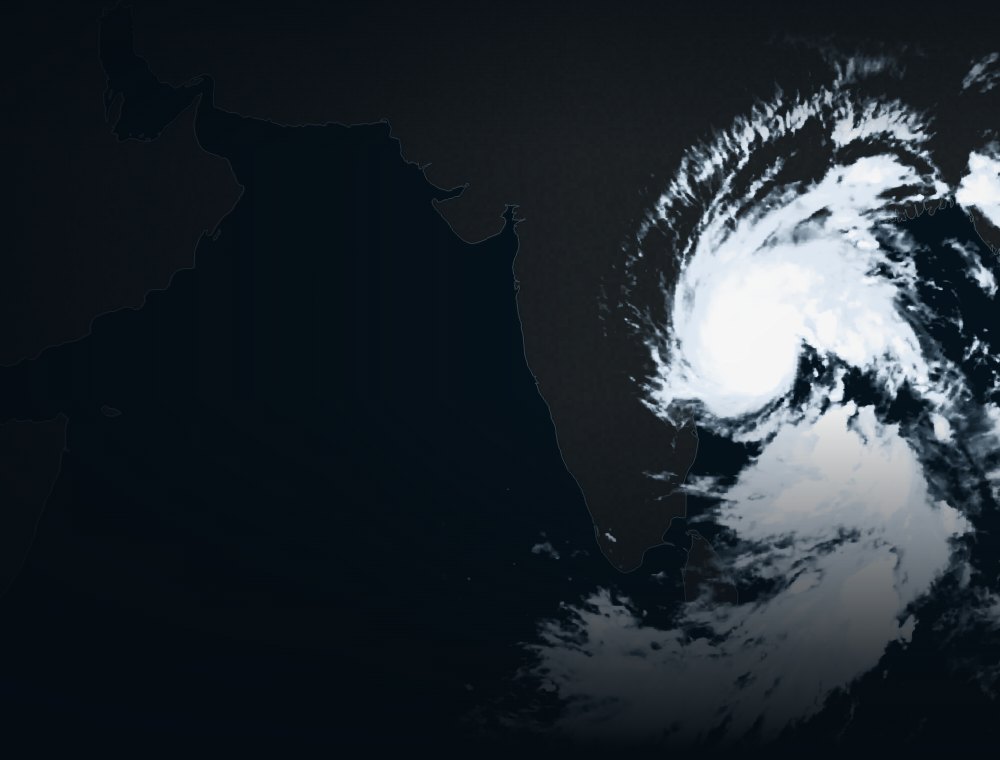 Infrared satellite image of Cyclone Arnab spinning over the Bay of Bengal, with the word Cyclones.